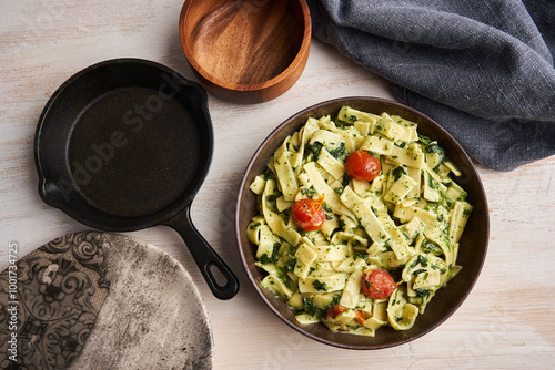 Penne rigatte with blue cheese sauce and tomatoes photo