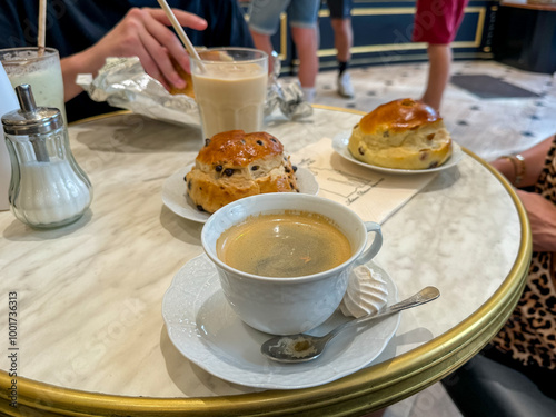 Prague, Czech Republic - July 16, 2024: Coffee and pastries at a cafe in Prague in the Czech Republic
 photo