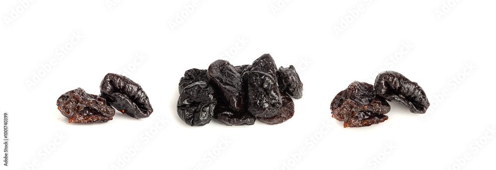 Dry Plums Isolated, Dried Black Fruits, Prune Group, Dry Plum Fruit on White Background Dry Plums Isolated, Dried Black Fruits, Prune Group, Dry Plum Fruit on White Background