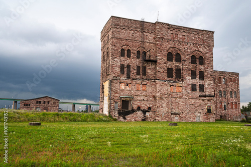 Historical Buildings of St Marys Paper in Sault Ste Marie Ontario with International Bridge in Background photo