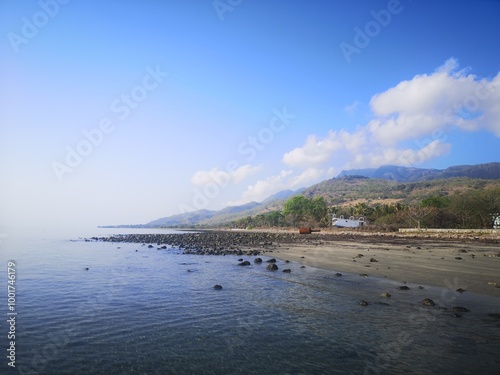 Discover the tranquil beauty of Atauro Island in Timor-Leste's serene coastal landscape during a sunny day