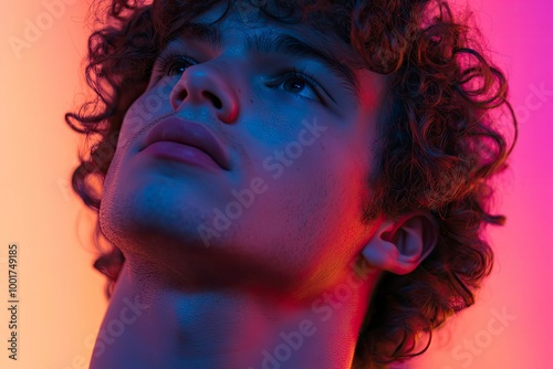 Close up view from the side. Young man with curly hair is indoors illuminated by neon lighting.  with generattive ai photo