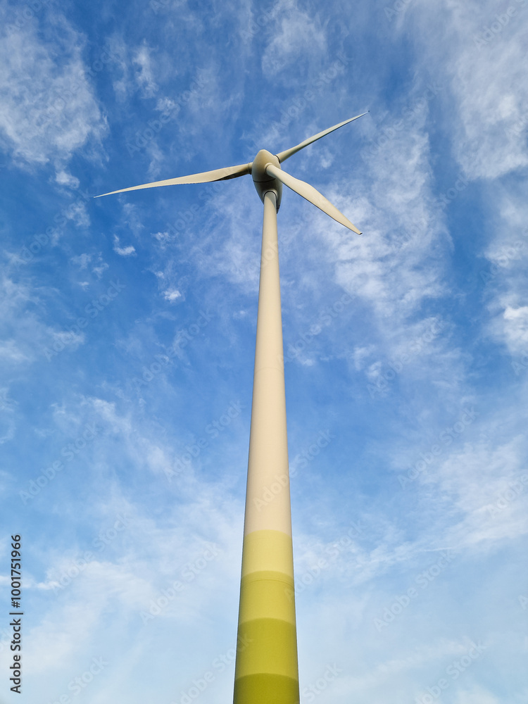 Wind Turbine in Rural Landscape Under Blue Sky Wind Turbine in Rural Landscape Under Blue Sky
