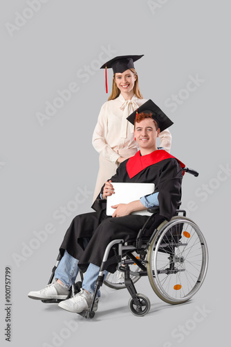 Male graduate in wheelchair...