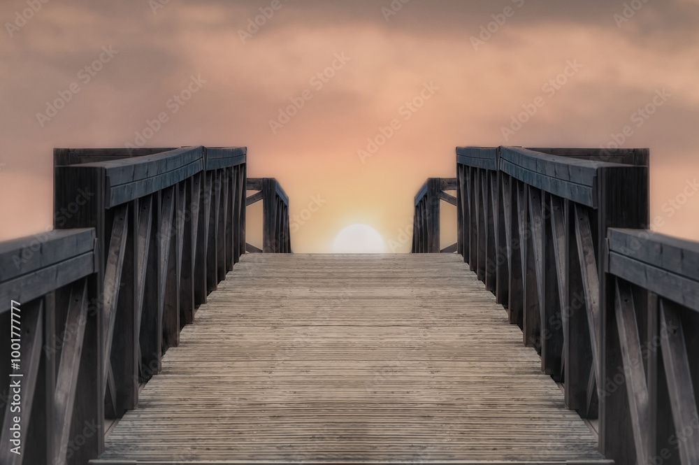 Fototapeta premium sunset view from wooden pier bridge