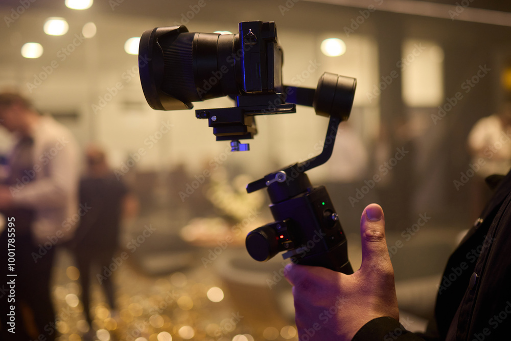 Fototapeta premium A Professional Camera Stabilizer utilized at a thriving Event setting for capturing stunning visuals