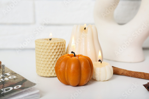 Burning candles in shape of...
