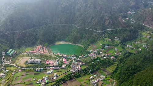 Aerial view of khurpatal lake in smanora range. A beautiful image of khurpatal lake and houses in uttarakhand in India. photo