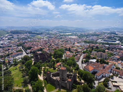 Aerial view of Guimaraes city, Castelo Guimaraes Castle and Paço dos Duques. Cityscape seen from the air. Portugal. Drone