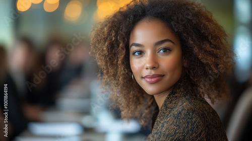 Professional woman reviewing documents during a business meeting in a boardroom 