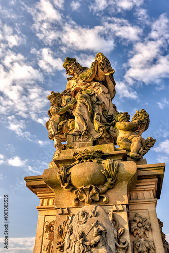 Prague, Czech Republic - July 19, 2024: Statues of Saint Ludmila along the Charles Bridge in Prague in the Czech Republic
 photo