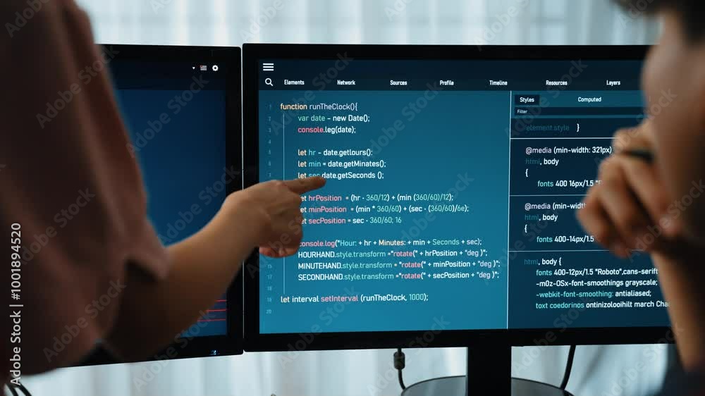 Slow motion back end software developer engineer for computer programming working together on debugging writing computing code, solving complex algorithms display on monitor in office. Burgeoning