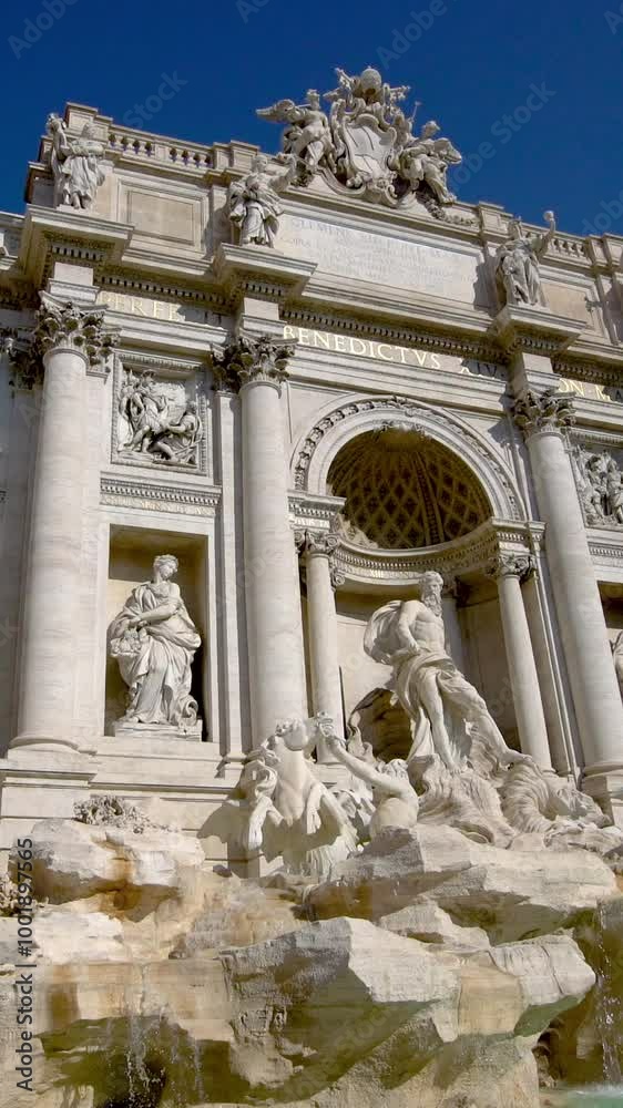 The Trevi Fountain is a fountain in the Trevi district in Rome, Italy. It is the largest Baroque fountain in Rome and one of the most famous fountains attracting tourist visiting Rome. The Trevi Fountain is a fountain in the Trevi district in Rome, Italy. It is the largest Baroque fountain in Rome and one of the most famous fountains attracting tourist visiting Rome.