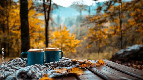 A lunch in the fall outdoors. Coffee glasses while camping on a wooden table in a quaint woodland. calming beverages while slowly moving outside. Warm drinks in reusable cups. Fall vibes and morning 