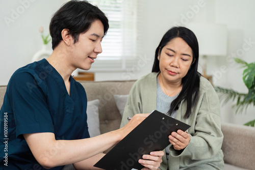 Healthcare Professional Conducting Home Visit with Patient, Providing Personalized Medical Care in a Comfortable Home Environment