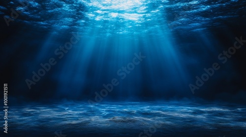 Beautiful deep blue ocean scene with rays of sunlight piercing through the water, creating a mesmerizing underwater landscape