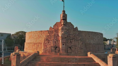 This video showcases the Monument to the Heroes of the Caste War, located in the city of Campeche, Mexico. The monument is a large, stone structure that features intricate carvings depicting various