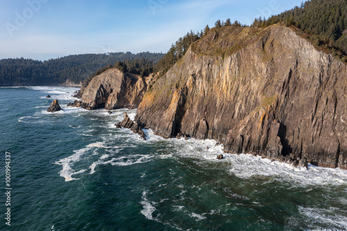 High quality aerial drone photo of Devil's Cauldron at Elk Flats Trail in the beautiful Oregon Coast, near Manzanita, rocky beaches, and great views towards the Pacific Ocean.   photo