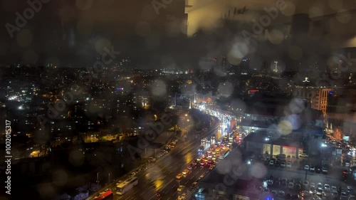 Busy street in Istanbul city at rainy night