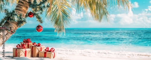 A tropical Christmas scene with a palm tree decked in festive decorations, gift boxes on white sand, and a stunning blue sea in the background