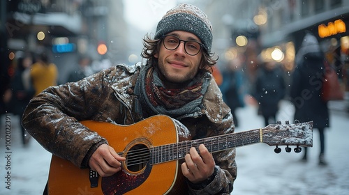 A young musician with glasses plays his guitar in a snowy urban setting, blending melodies with the sounds of passing winter shoppers. The charm of the moment captures the joy of street performances