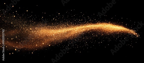 Abstract golden glowing particles isolated on black background.