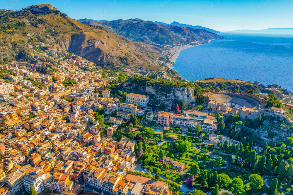 Fototapeta premium Aerial view of the Ancient theater of Taormina with Mount Etna in the background, Sicily, Italy