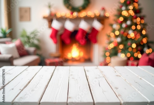 A wooden table in front of a fireplace with stockings hanging from it.