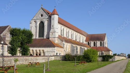 Abbaye de Pontigny, a Cistercian abbey in Burgundy, France under a clear blue sky