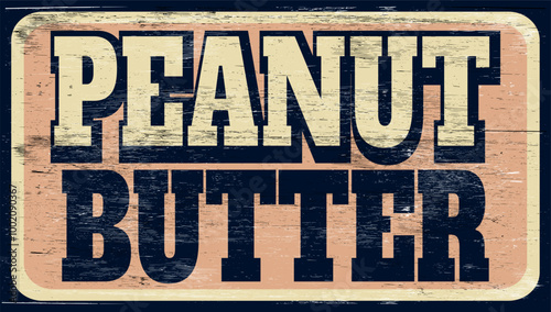 Aged and worn peanut butter sign on wood