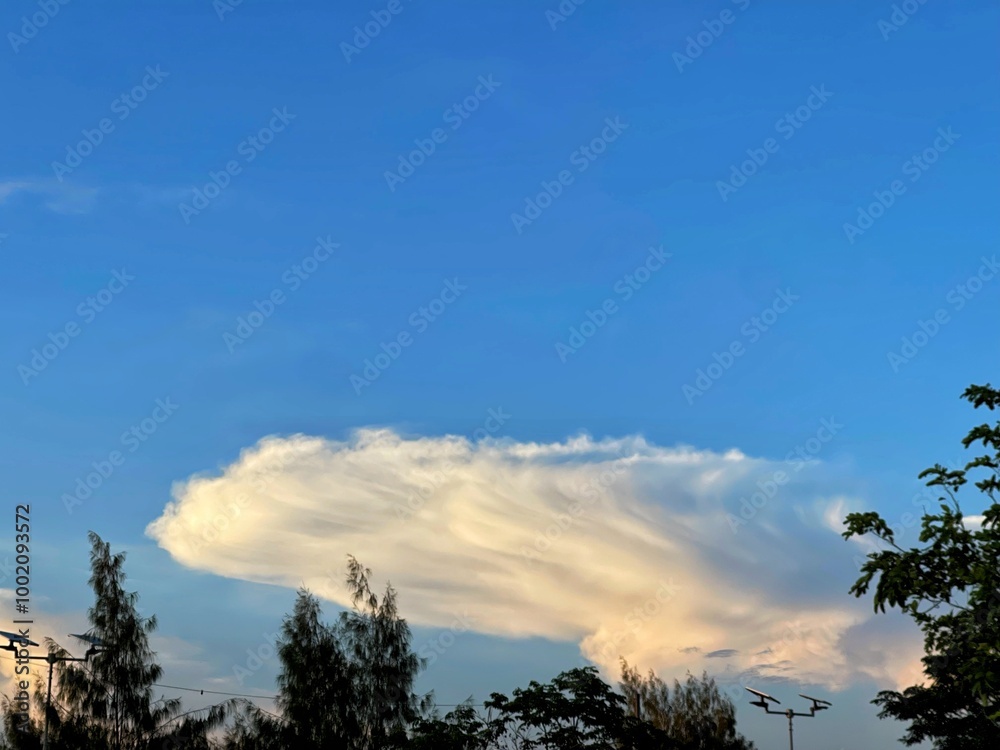 Obraz premium Cloudy blue sky abstract background, blue sky background with tiny clouds.