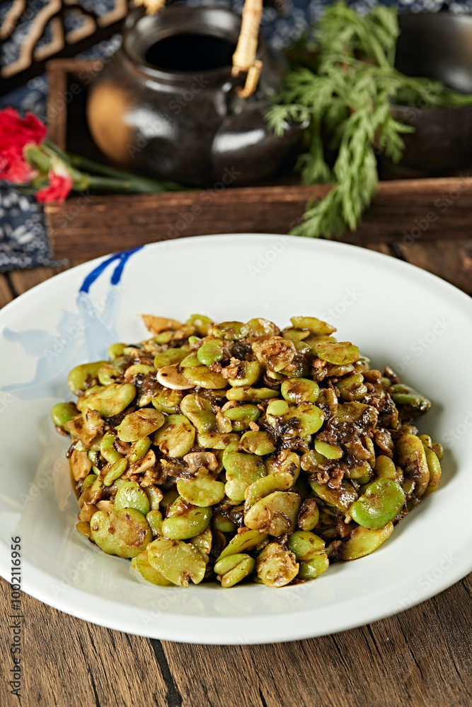 Stir-fried broad beans with meat and plum vegetables Stir-fried broad beans with meat and plum vegetables