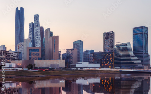 Fototapeta Naklejka Na Ścianę i Meble -  Famous landmarks and tourist places in Riyadh, King Abdullah Financial Center, financial and economic towers illuminated at night in the city of Riyadh, architectural art of towers and skyscrapers in 