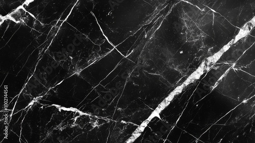 Dramatic black and white marble pattern. Bold veining creates dynamic visual interest. Perfect backdrop for modern, minimalist compositions. Background