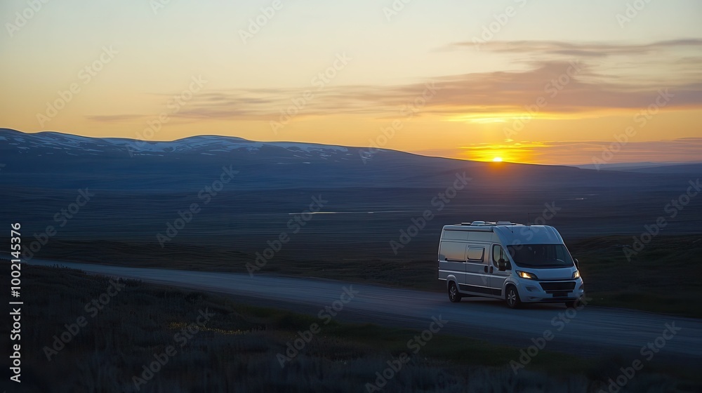 Fototapeta premium Tourists Driving Rental Camper Van at Sunset
