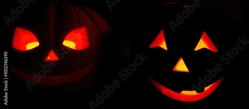 Two Jack-o'-Lanterns Glowing in the Dark