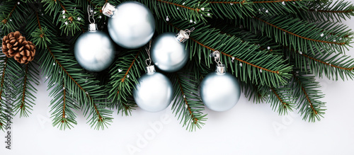 Silver Christmas Ornaments on Pine Branch