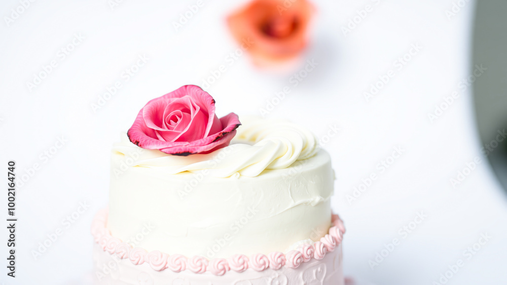 Elegant White Cake with Pink Rose Decoration Elegant White Cake with Pink Rose Decoration