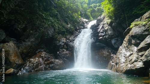 Scenic waterfall in a tropical holiday destination, leaving ample room for copy.