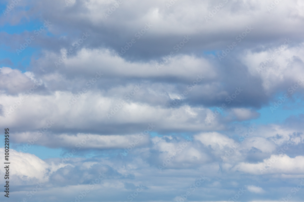 White clouds against a blue sky White clouds against a blue sky