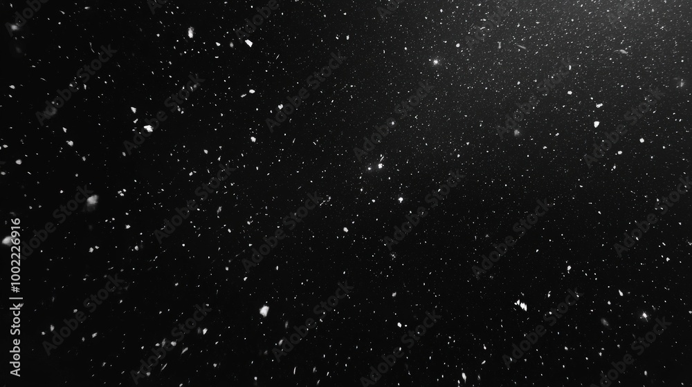 Obraz premium Snow Falling on Black Background in Slow Motion