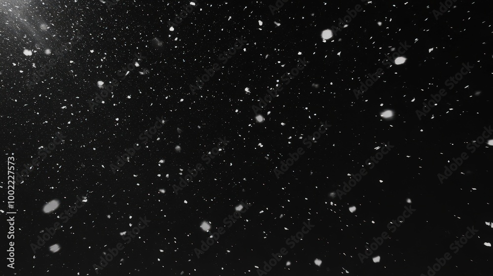 Obraz premium Slow Motion Snowfall on Black Background