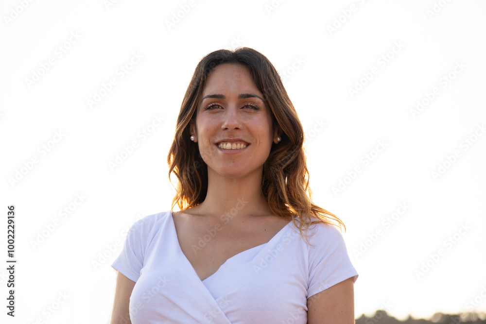 Smiling beautiful woman wearing white top Smiling beautiful woman wearing white top