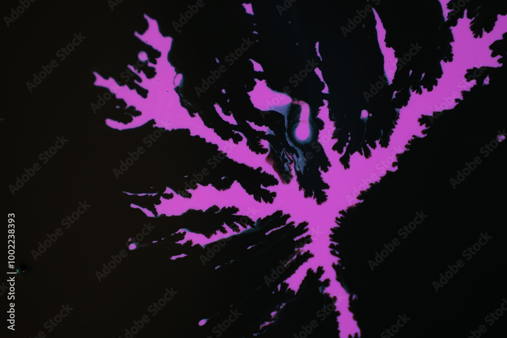 A dark background with purple spots, creating a pattern of electric blue and magenta graphics. The mix of carmine and violet adds a touch of mystery and darkness to the design