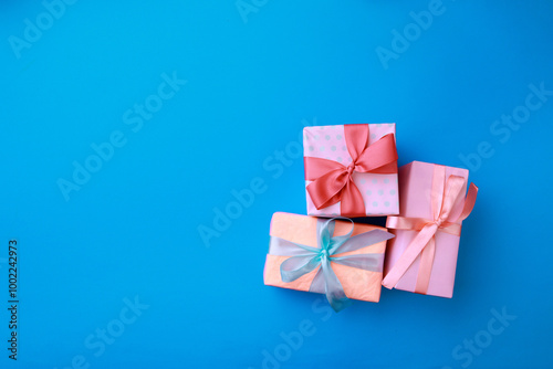  Gift boxes on color background. Happy womens day. Happy Mothers day.Hello Spring- Image