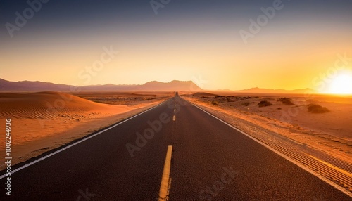 Desert highway at sunset