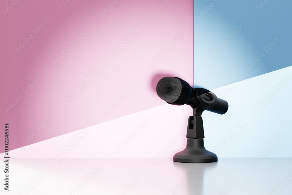 Black microphone on pastel geometric background Black microphone on pastel geometric background