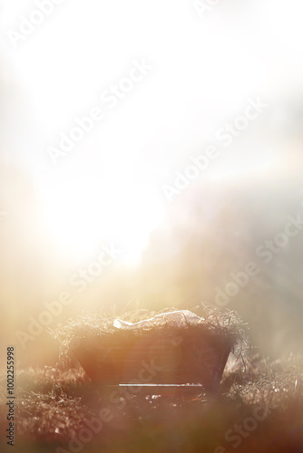 Bild auf Leinwand A bright light shines in the manger blessing the baby Jesus, the birth backgroun