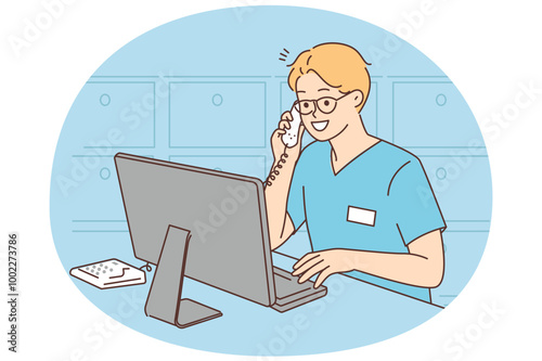 Smiling doctor talk on phone work on computer