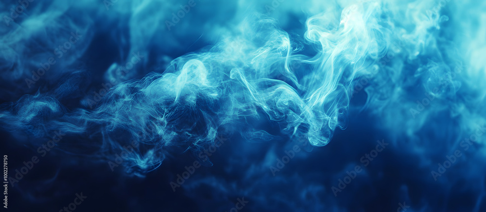 Obraz premium Ethereal Blue Smoke Swirls on Dark Background for Creative Designs and Visual Art